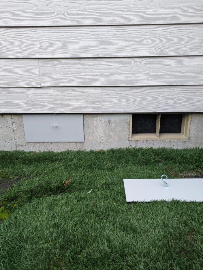 a house with vent covers.